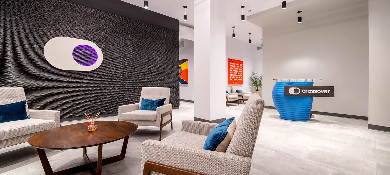 Crossover Health clinic reception and lounge area.