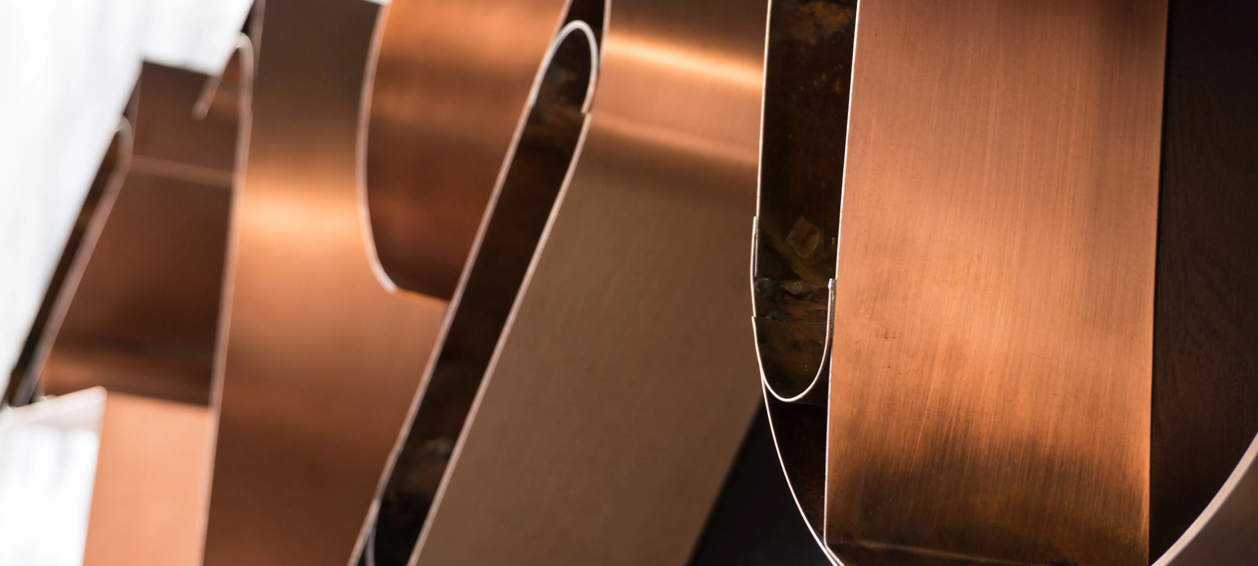 Close crop of brushed copper numeral edges.