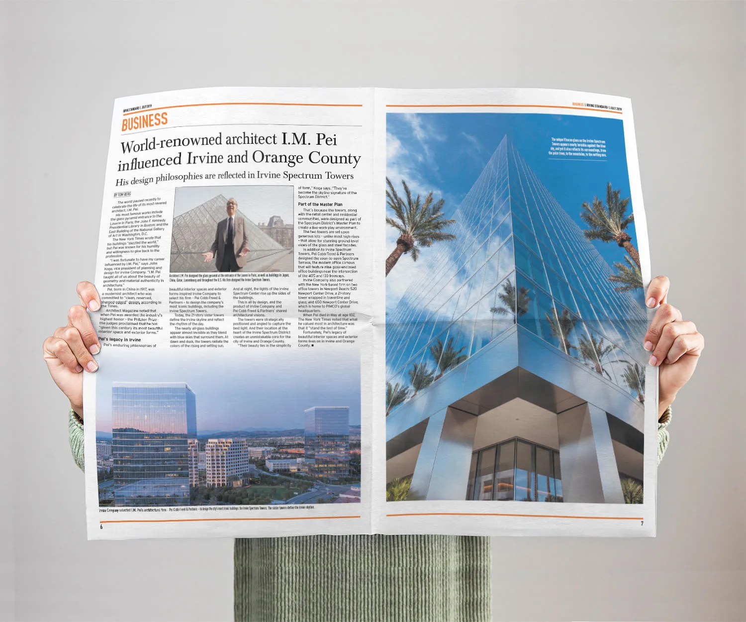 Irvine Standard spread on architect I.M. Pei held open in two hands.