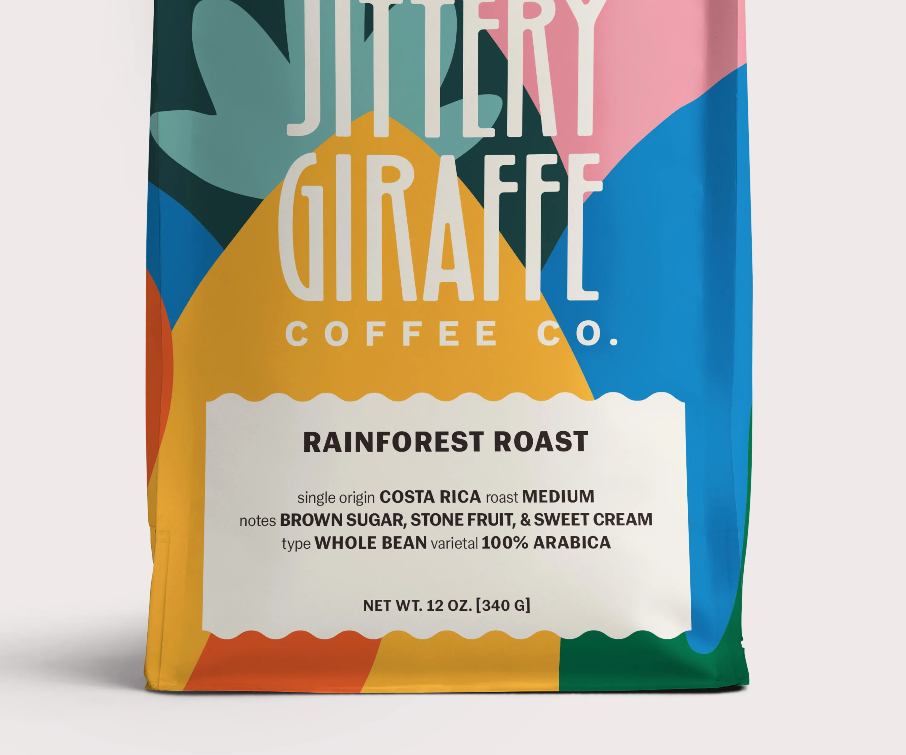 Close-up of the Jittery Giraffe Rainforest Roast bag label.
