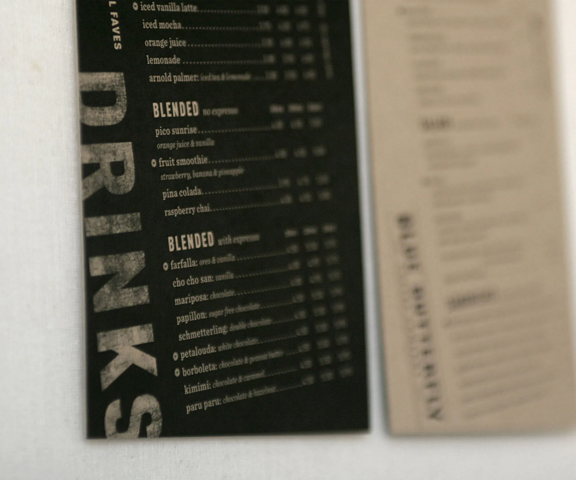 Printed drinks and food menus on kraft stock.